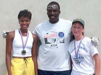 Singles Finalists Tracy and Theresa receive medals from ICHA President Paul Williams
