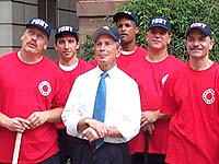 <font size=-1>Mayor Bloomberg with members of the Fire Dept team during the longball contest</font>